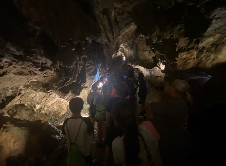 students walking through Crystal Cave